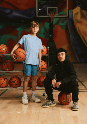 two child with ball